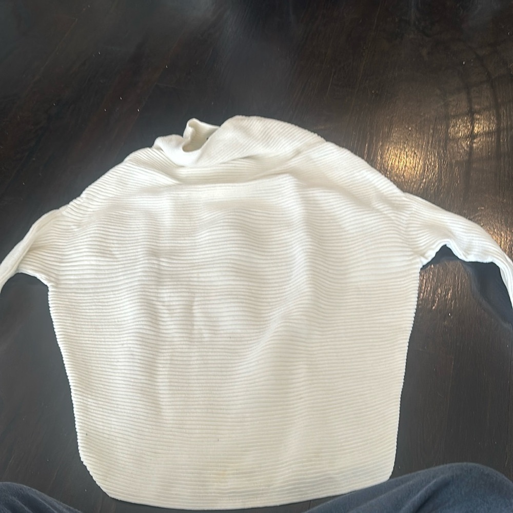 Designers remix mock neck sweater